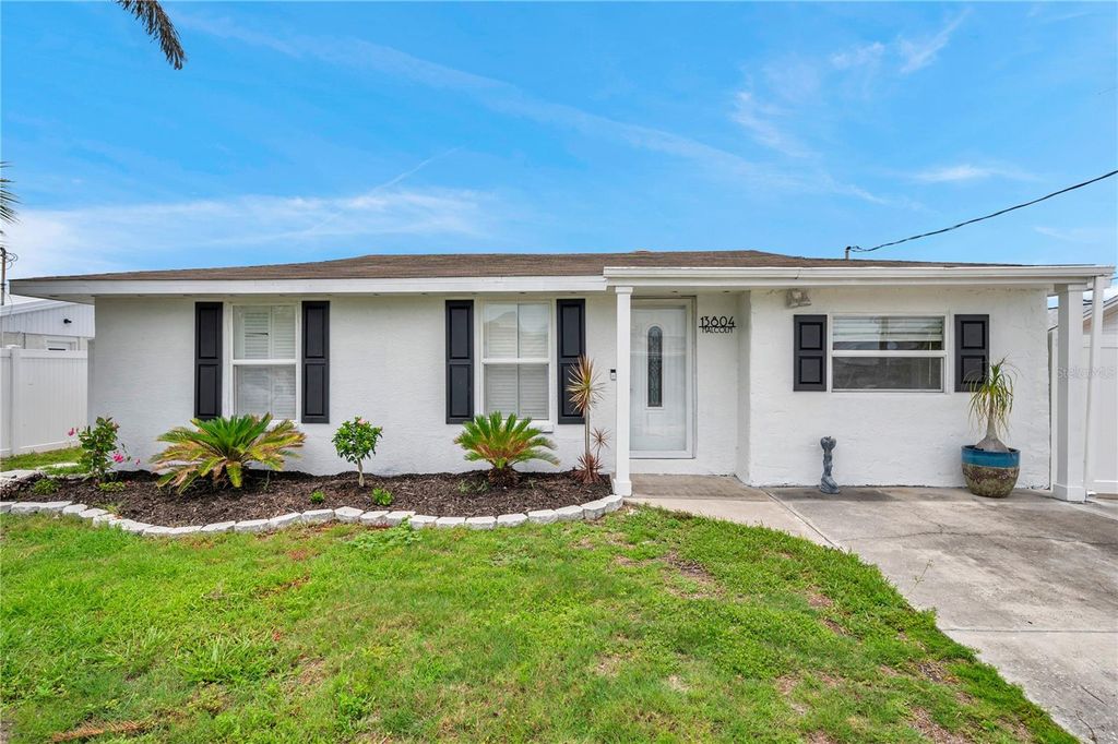 Photo of 13804 Malcolm Avenue, Hudson, FL 34667 (MLS # TB8402119)