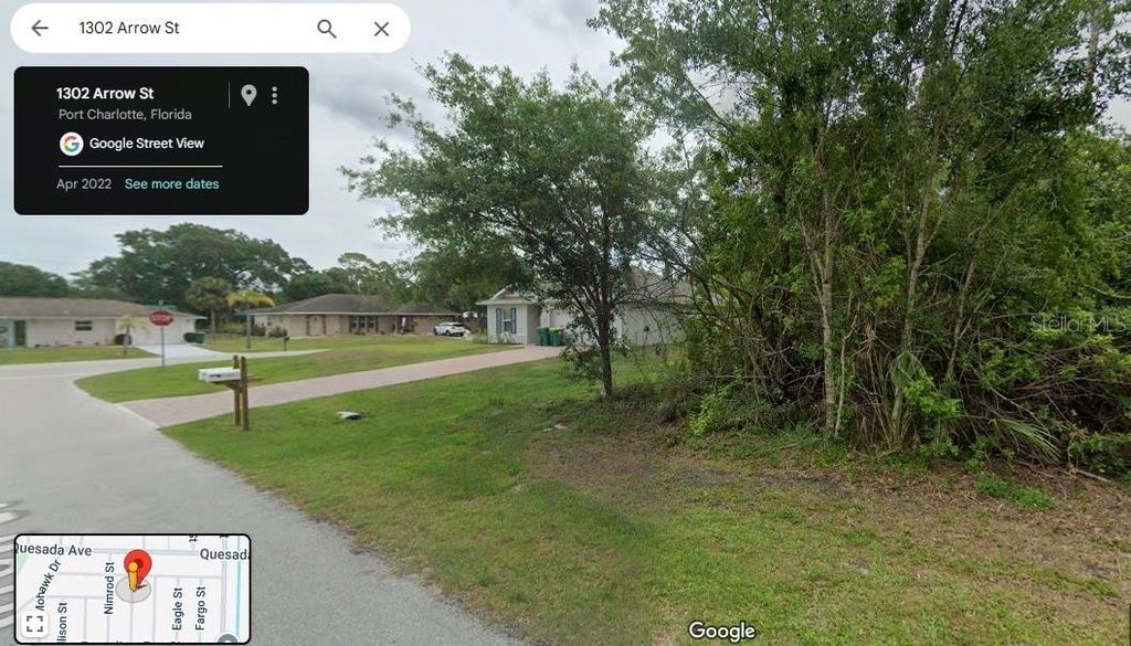 Photo of 1302 Arrow Street, Port Charlotte, FL 33952 (MLS # O6335935)