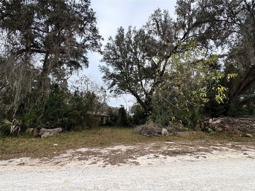 Check out this .50 acre lot in South Ocala. With lots of new construction in the area, this one is ripe for the pickens. The existing mobile is not habitable, please do not enter the home for safety reasons. Well, septic and power are installed on the property and were in functional order when the home was last lived in.