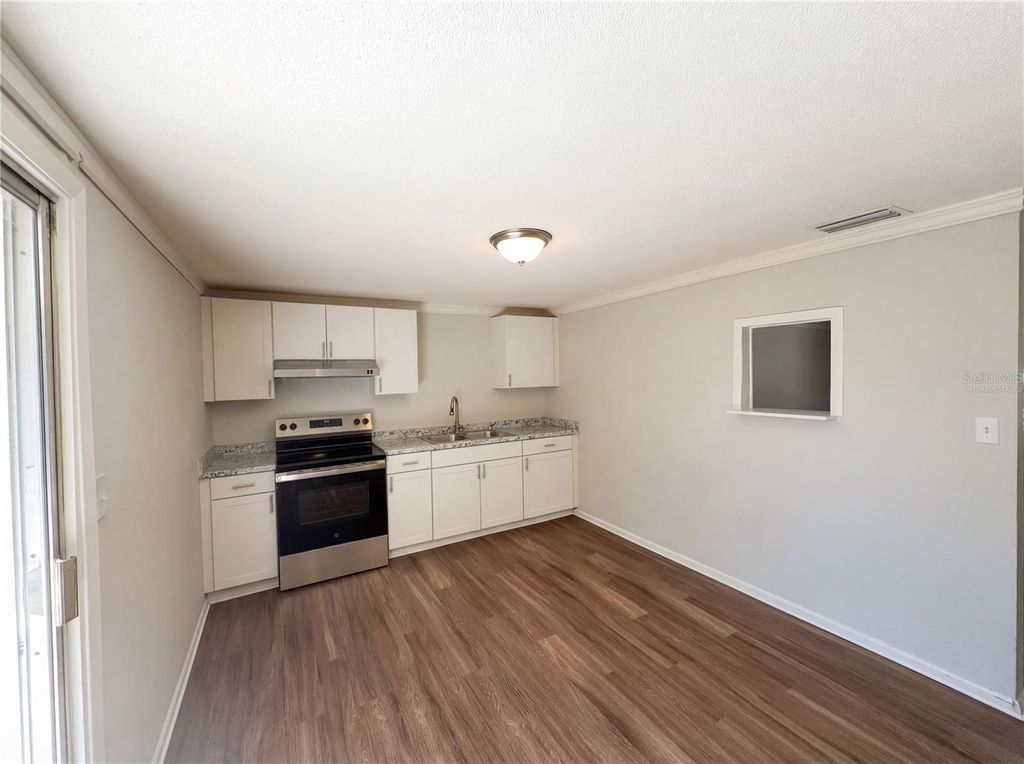 Photo of 1830 Bellgrove Street, Lakeland, FL 33805 (MLS # O6393228)