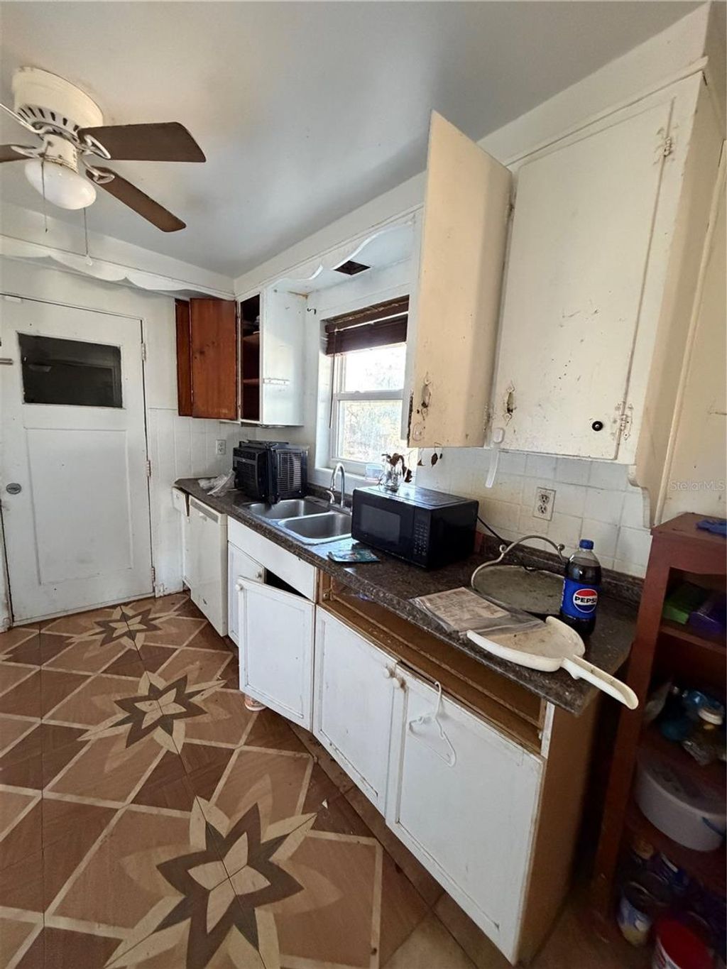 Photo of 2917 Forest City Terrace, Orlando, FL 32810 (MLS # O6384934)