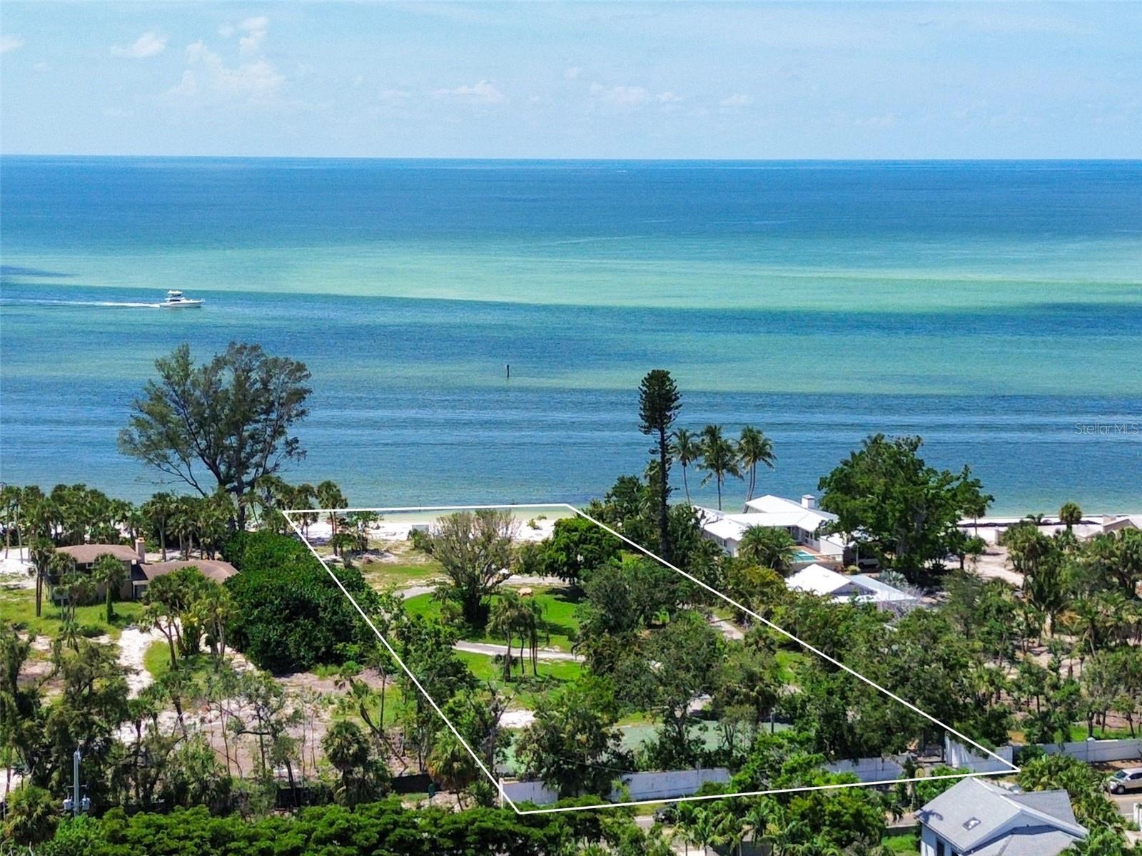 For the first time in 35 years, 4214 Higel Avenue is available—one of only 7 estates boasting a private beach on this ultra-exclusive stretch of Siesta Key. Spanning approximately 1.6 acres with an unrivaled 142 feet of private beachfront and 451 feet of depth, this is a rare opportunity to own a generational piece of Sarasota’s most coveted coastline. With direct access to Big Pass and unobstructed Gulf views, this property offers an unparalleled waterfront lifestyle. Whether you envision a modern masterpiece or a timeless beachside sanctuary, this expansive homesite provides the space, privacy, and exclusivity to bring your vision to life. For those seeking inspiration, a separate residential listing features a visionary concept designed by Stofft Cooney Architects and in collaboration with Perrone Construction. Explore MLS#A4646499 to discover the renderings and build opportunities for a truly exceptional home. A property of this caliber is a rarity—don’t miss the chance to build your legacy on Sarasota’s most exclusive shoreline.