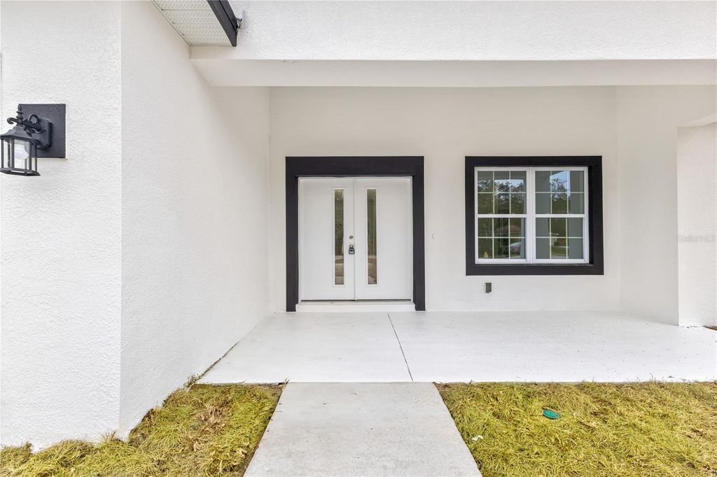 Photo of 284 E Finland Lane, Citrus Springs, FL 34434 (MLS # O6394540)