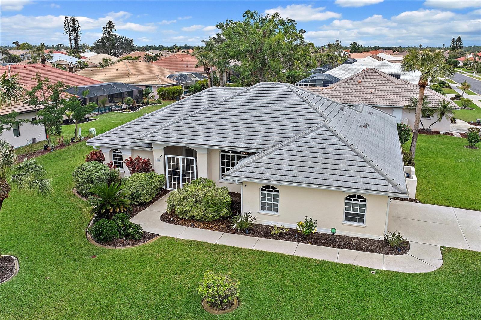 AMAZING PRICE on this stunning pool home located in the highly sought-after community of The Lakes of Jacaranda. This meticulously cared-for 3-bedroom, 2-bathroom home is move-in ready and boasts a newer tile roof (2021) along with hurricane protection windows and doors. The layout is open and bright! As you step through the front door, you'll be greeted by a recently painted living room with high ceilings and a lovely view of the pool and spacious lanai. The lanai offers plenty of room for outdoor living and comes equipped with peace-of-mind hurricane shield screens. The kitchen is a delight, featuring beautiful granite countertops, newer appliances, white cabinets, and a stylish tile backsplash. You'll also appreciate that there is no carpet in the home, making maintenance a breeze. Take note of the newer ceiling fans in all the bedrooms, living room, kitchen, and lanai. The garage has 85 Feet of storage shelving! The garage floor is epoxy. The split bedroom layout is great, and all the bedrooms are generously sized. Care Notes: roof 2021, HVAC 2021,new electrical panel 2023, irrigation well pump 2022, custom blinds 2023, all appliances 2020 or newer, freshly painted including ceilings 2023, pool deck painted 2025, new solar pool panels 2025. This HOME at 538 Laurel Cherry is a peach of a home!