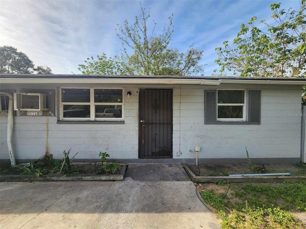 Photo of 1115 E Linebaugh Avenue, Tampa, FL 33612 (MLS # TB8525278)