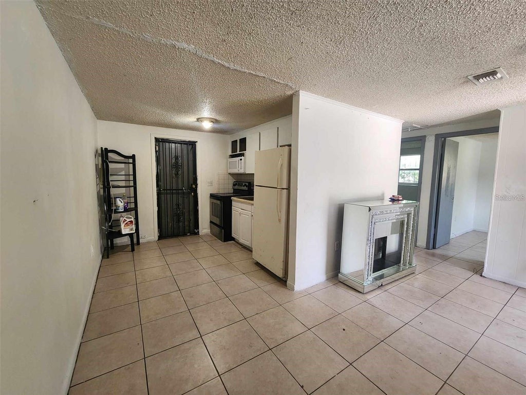Photo of 1115 E Linebaugh Avenue, Tampa, FL 33612 (MLS # TB8525278)