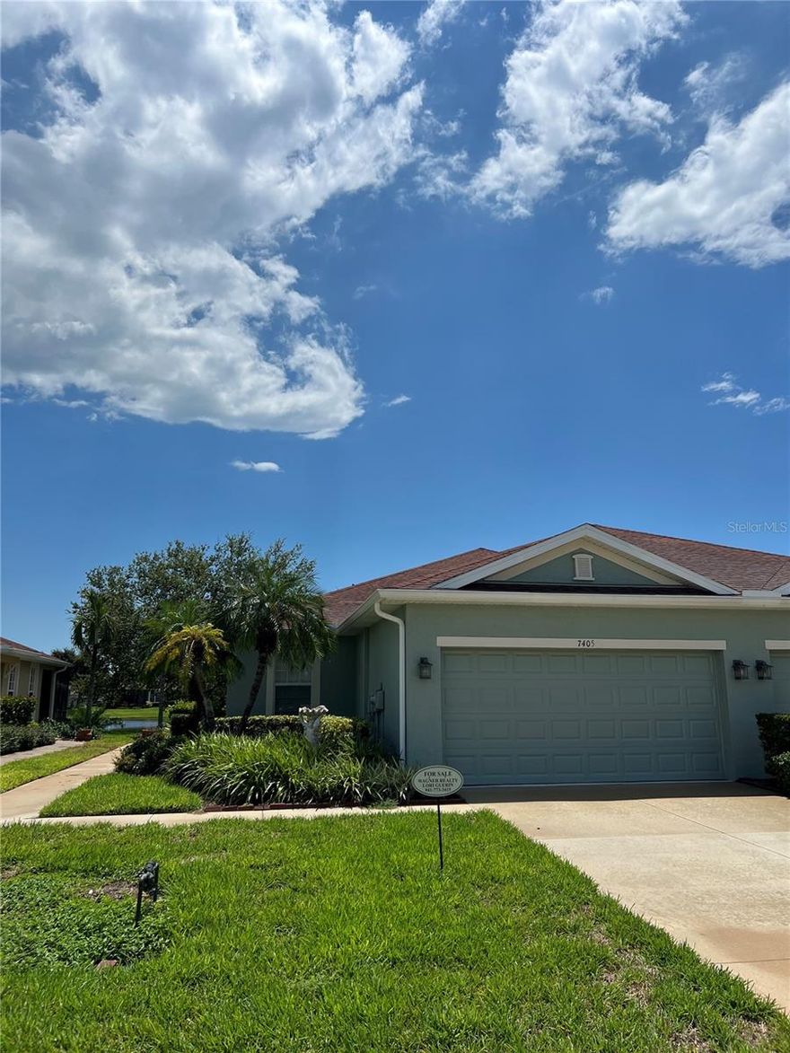 Fantastic Value in Palma Sola Trace!

Move right into this beautifully maintained 2-bedroom, 2-bath villa with a den, ideally located just steps from the clubhouse, resort-style pool, fitness center, and mailbox.

Enjoy serene lake views from the privacy of your screened lanai, perfect for relaxing or entertaining. Inside, you’ll find fresh paint throughout, a light-filled, open layout, and a spacious kitchen with ample counter space. Flooring includes durable tile throughout, with cozy carpet in the bedrooms.

Additional highlights include a large utility room with extra storage and accessibility-friendly features, such as a walk-in tub in the guest bathroom.

This villa offers low-maintenance living in a sought-after community—don’t miss out!