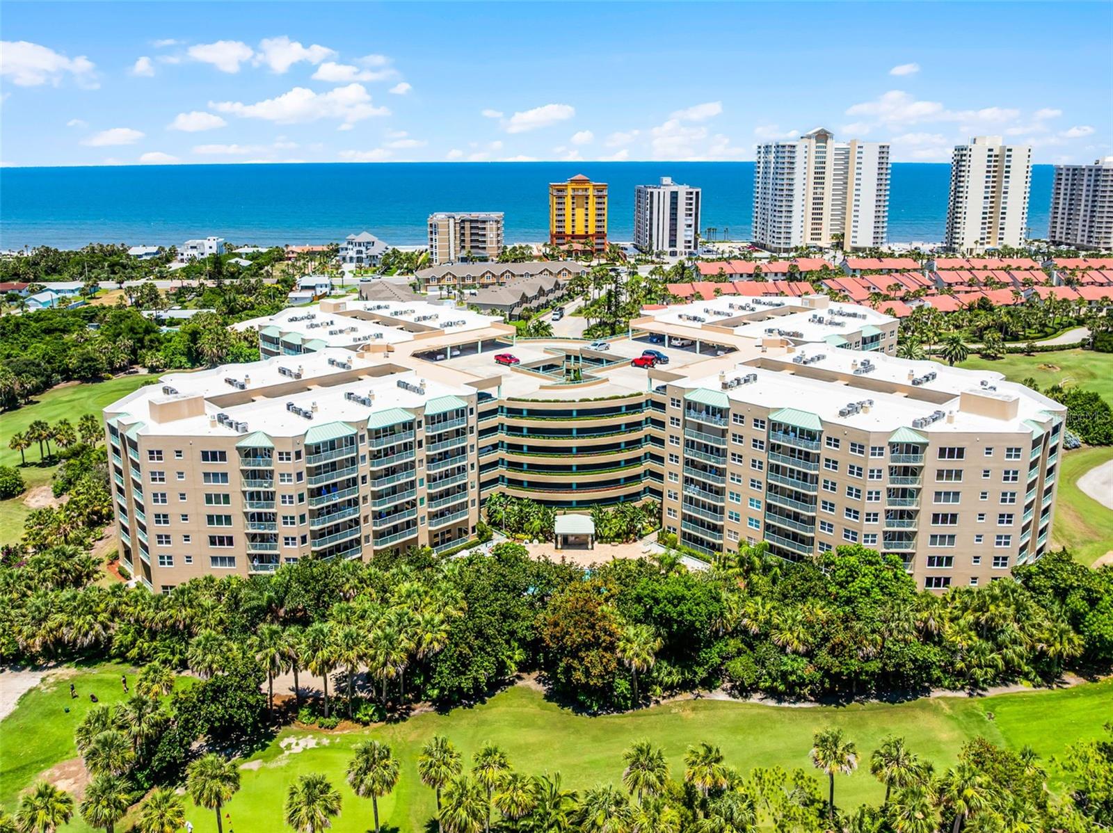 If you’ve been dreaming of an effortless coastal home where you can walk to the beach, watch the boats from your balcony, and enjoy spacious, turnkey living, this is it. This beautifully furnished 3-bedroom, 2-bath condo offers over 2,100 square feet of bright, open living space with panoramic Intracoastal views from the owner’s suite, great room, and dining area. Located in one of Daytona Beach Shores’ most walkable communities, you're just a 2-3 minutes walk to the shoreline, 1-2 minutes walk to Publix supermarket, and within 5 minutes or less by bike or car to dining, cafés, and more. The iconic Daytona Beach Boardwalk and Shoppes sit just 2 miles away, offering entertainment and oceanfront charm at your fingertips. The kitchen is both functional and refined, featuring stone countertops, stainless steel appliances, a spacious walk-in pantry, pull-out drawers, tile backsplash, and designer lighting. Brazilian Koa engineered plank and tile flooring run throughout the unit, adding elegance and easy maintenance. The oversized owner’s suite features generous closets and direct balcony access perfect for enjoying golden-hour views and peaceful mornings. Additional highlights include in-unit laundry and the rare luxury of being able to drive to your floor and park steps from your front door. With a low $965/year HOA, you’ll enjoy access to resort-style amenities including indoor and outdoor pools, full gym, sauna, library, golf course, storage, and more. Fully furnished, move-in ready, and perfectly situated, this home offers a rare blend of comfort, convenience, and coastal elegance designed for those who value space, style, and a lifestyle that feels like a permanent vacation.