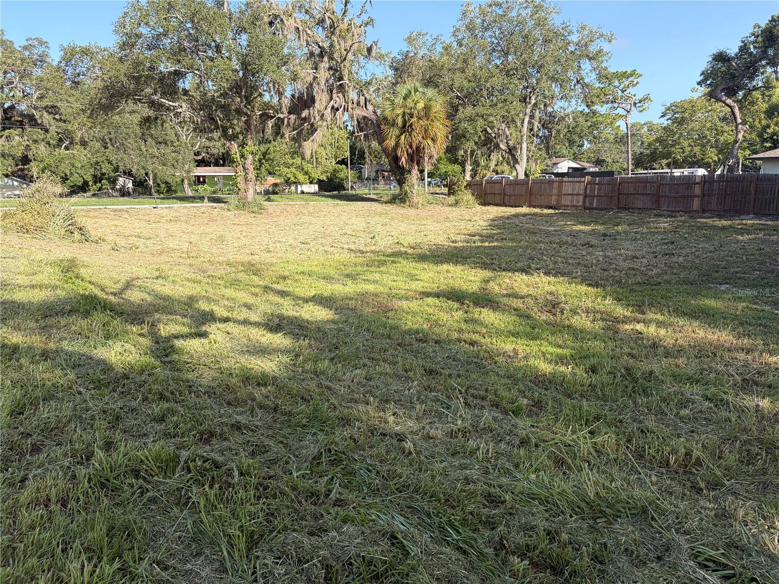 View from the back of the lot to the road facing west