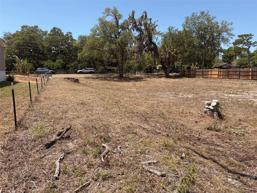 Are you looking for your forever home or winter retreat?  Cleared & high & dry partially cleared vacant .44 acre property with utilities nearby on a paved street with sidewalks.  No HOA or CDD fees.  Water, electric hook up and sewer hock up across the street for easy access.  Fantastic location close to Tampa and the beaches centrally located for amazing accessibility.  Zoned to allow for built homes or mobile / modular homes.  Ask about loan options with only 5% down to buy the property and the home all together.