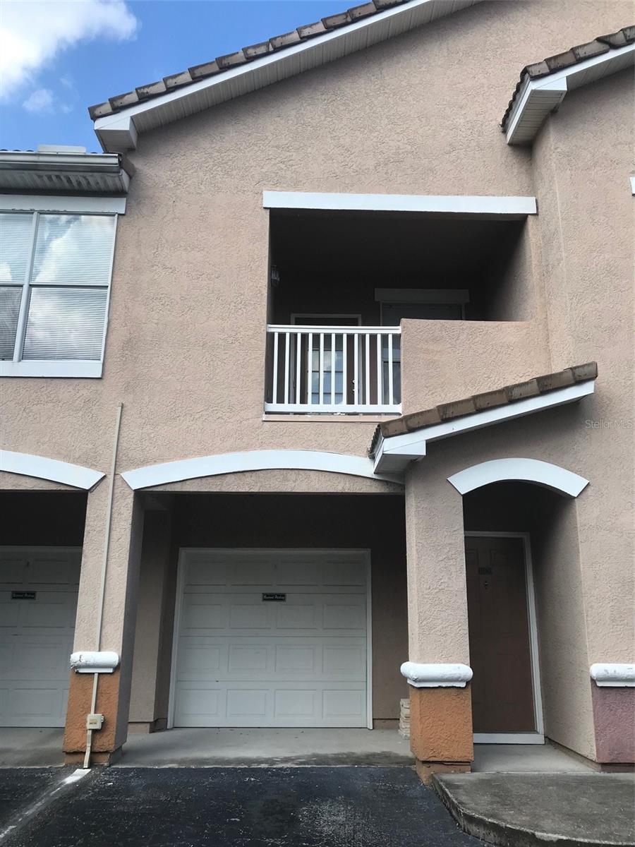 Excellent hassle-free opportunity for an investor or an owner occupant. The Villas Condominiums is a gated community located in desirable New Tampa. This well maintained 1 bedroom, 1 bath, 1 car garage is a perfect addition to your rental portfolio or the perfect place to live a pleasant life. Great tenant in place for the past 6 yrs could stay or go. The current lease expires on October 31st. The rent is $1350/ month and tenant pays electricity and water. The unit features a vaulted ceiling, crown molding in the bedroom, open floor plan, granite countertops in kitchen and bath, in-unit laundry and a private balcony. Unit renovated in 2019: A/C, appliances, granite countertops, floors, & bathroom vanity. Internet and cable are included in HOA fee. The community offers a resort style pool, fitness center, clubhouse, playground,& car wash area. Conveniently located minutes from I-75, USF, hospitals, shopping, dining, and Flatwoods Park.