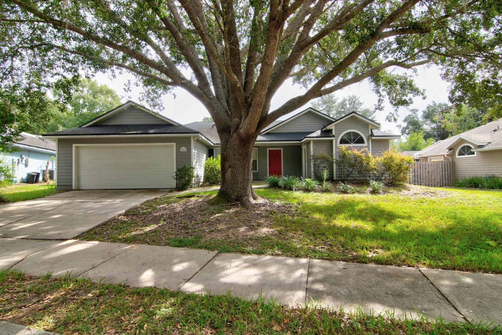 Welcome to this beautiful 3-bedroom, 2-bath home in desirable Eagle Pointe! Offering 1,854 sq. ft. of living space, this home features LVP flooring throughout the main areas and a bright, open layout with vaulted ceilings. The spacious primary suite includes a tray ceiling, dual-sink vanity, relaxing garden tub, and glass-enclosed shower. Multiple living and dining spaces provide flexibility with a formal living room, dining room, family room, and breakfast room. The cozy living room fireplace adds warmth and charm. Step outside to enjoy the fully covered, screened lanai overlooking a large, fenced backyard—perfect for entertaining or relaxing in privacy. Don’t miss your chance to make this inviting home yours!
