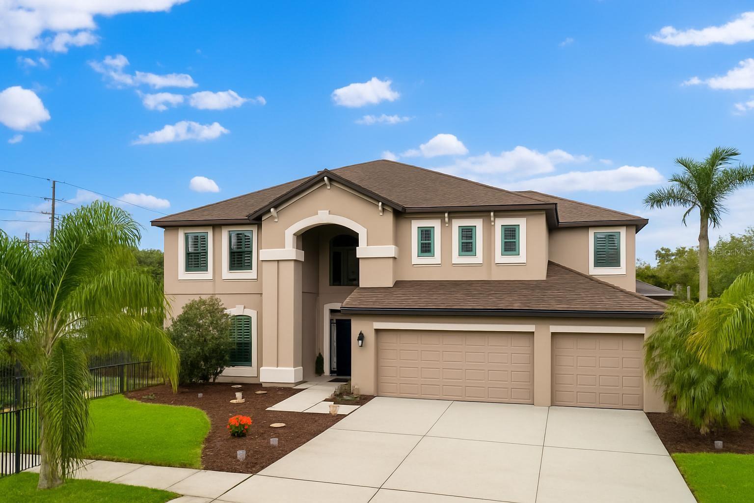 NON FLOOD ZONE! Located in a gated community of just 20 homes, this 5-bedroom, 3-bath Saltwater Pool Home with a 3-Car Garage offers nearly 3,500sqft of living space on an almost 1/3 acre lot—no flood insurance required. Enjoy Equestrian Views of horse stables across the street from the 365sqft balcony, a saltwater pool, fenced in yard, and an expansive brick-paved patio perfect for entertaining. The open kitchen features a dry bar and wine fridge, with formal dining and living spaces for added flexibility. A bedroom ensuite is located downstairs, perfect for guests. Upstairs, the Owner’s Suite includes dual walk-in closets, a whirlpool tub, and separate shower + wet room. This home features 5 Bedrooms PLUS a Theater/Media Room. Recent updates include a 2025 Roof, 2024 Water Heater, 2024 Water Softener, NEW Plantation Shutters, Interior Paint. Just minutes to parks, trails, beaches, downtown St. Pete, Tampa International Airport, and 7 Hospitals.
