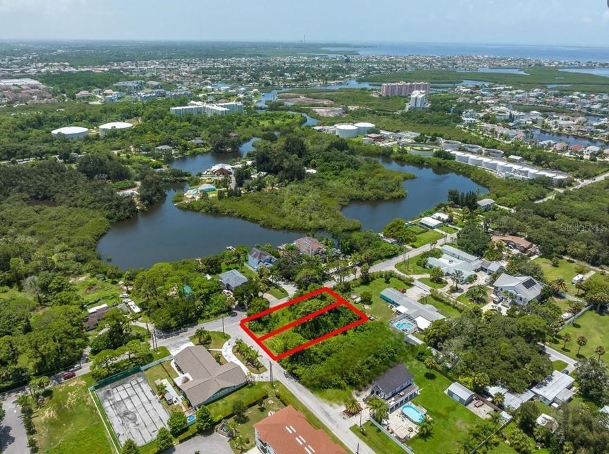 Location is everything! Just a short walk/golf cart ride to the highly sought-after downtown New Port Richey! Enjoy festive city events, Sims Park, dining, beaches, grocery and night life right at your fingertips! Build the home of your dreams on the perfectly situated corner AND neighboring lot nestled on the corner of Main St and Oelsner St. Listing is for BOTH lots, however, the seller will consider selling individually. These lots are level and ready to build your dream home with electric, water, cable and sewer all nearby for easy connections. Long term rental and short term vacation leasing available with no HOA (buyer to verify city or county guidelines)! Close to public transit, marinas, shopping and the picturesque Cotee River. Do not miss this opportunity to build your Florida dream! Lot 11 Folio: 06-26-16-0070-00200-0110. Lot 12 Folio: 06-26-16-0070-00200-0120.