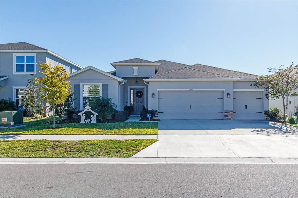 Photo of 7629 Broad River Avenue, Land O Lakes, FL 34638 (MLS # W7881422)