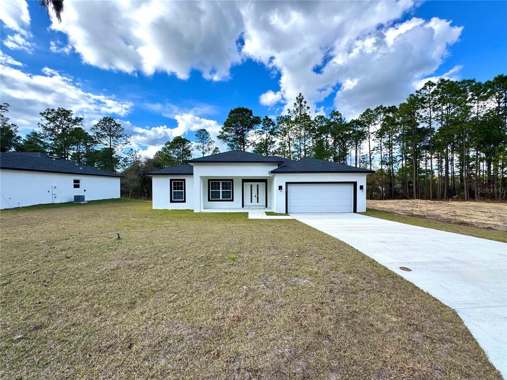 Photo of 7658 N Voyager Drive, Citrus Springs, FL 34433 (MLS # O6373024)