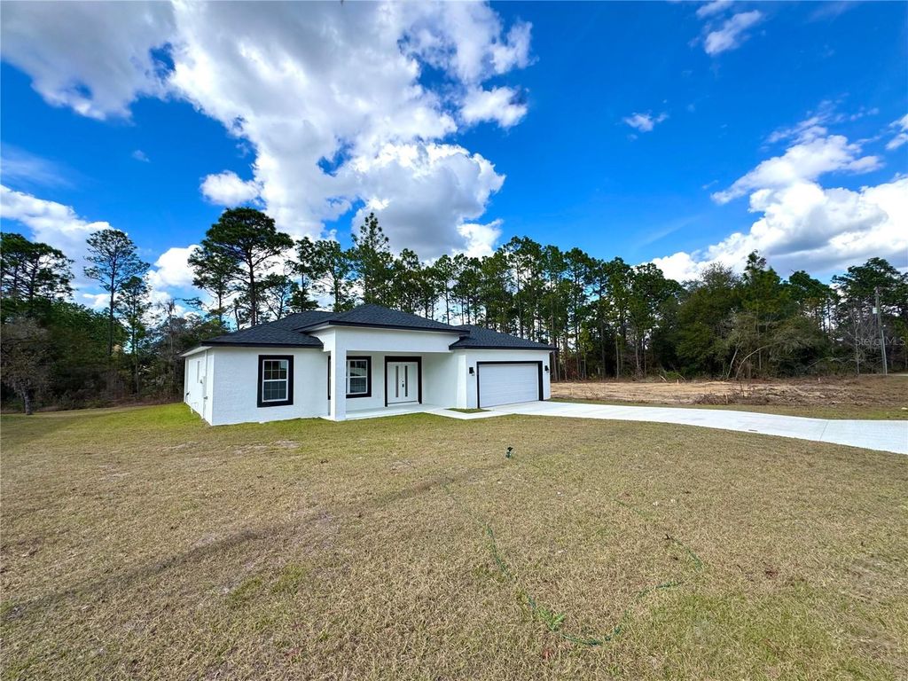 Photo of 7658 N Voyager Drive, Citrus Springs, FL 34433 (MLS # O6373024)