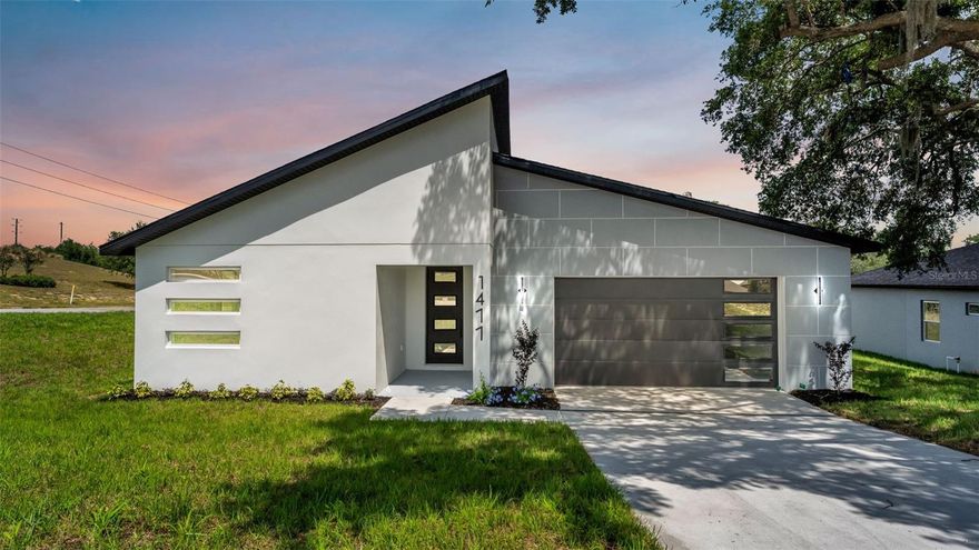 Modern New Construction in the highly desirable City of Davenport! This beautifully designed 4-bedroom, 2-bath home features an open-concept floor plan with soaring 10-foot ceilings and a sleek modern architectural style. The spacious kitchen offers quartz countertops, stainless steel appliances, and flows seamlessly into the main living areas, perfect for entertaining and everyday living. Enjoy durable laminate flooring throughout the home with tile flooring in the bathrooms for a clean, upscale finish. Located on a quiet private road for the perfect blend of privacy, comfort, and convenience. No HOA or CDD So bring all the Toys!! This property also includes an irrigation system. Conveniently located near I-4, making for an easy commute to both Tampa and Orlando, and just minutes from shopping, dining, and world-famous Walt Disney World Resort attractions. Call me today for a Private Showing!