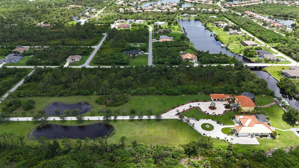 Photo of 1509 Mchugh Street, Port Charlotte, FL 33953 (MLS # O6317646)