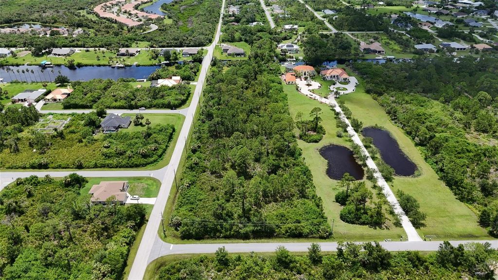 Photo of 1509 Mchugh Street, Port Charlotte, FL 33953 (MLS # O6317646)