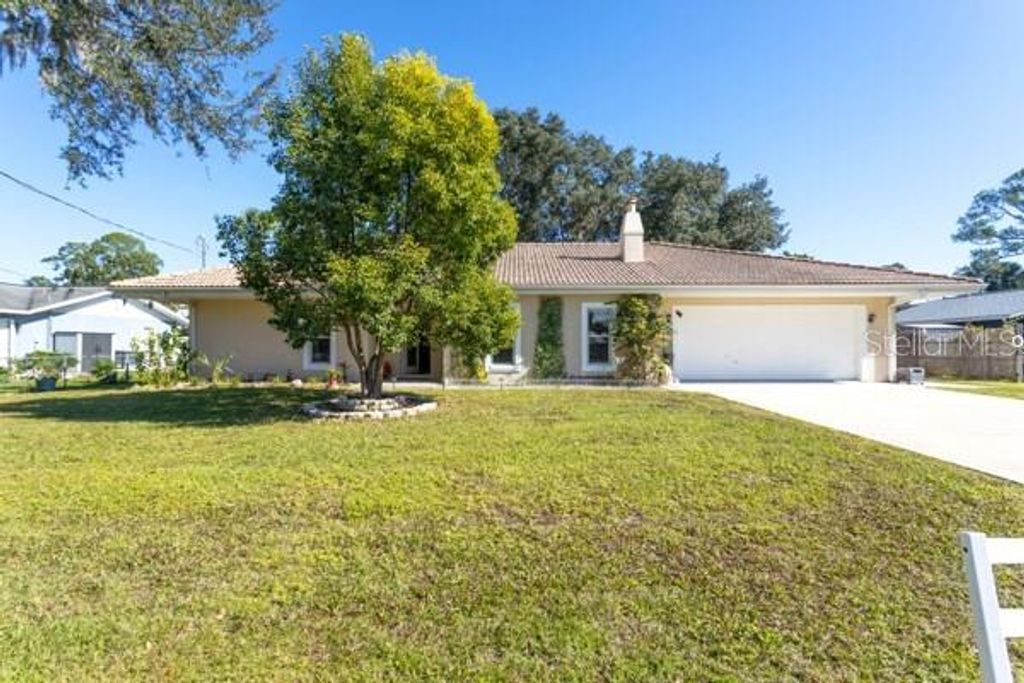 Photo of 504 N Cherry Street, Bunnell, FL 32110 (MLS # FC313691)