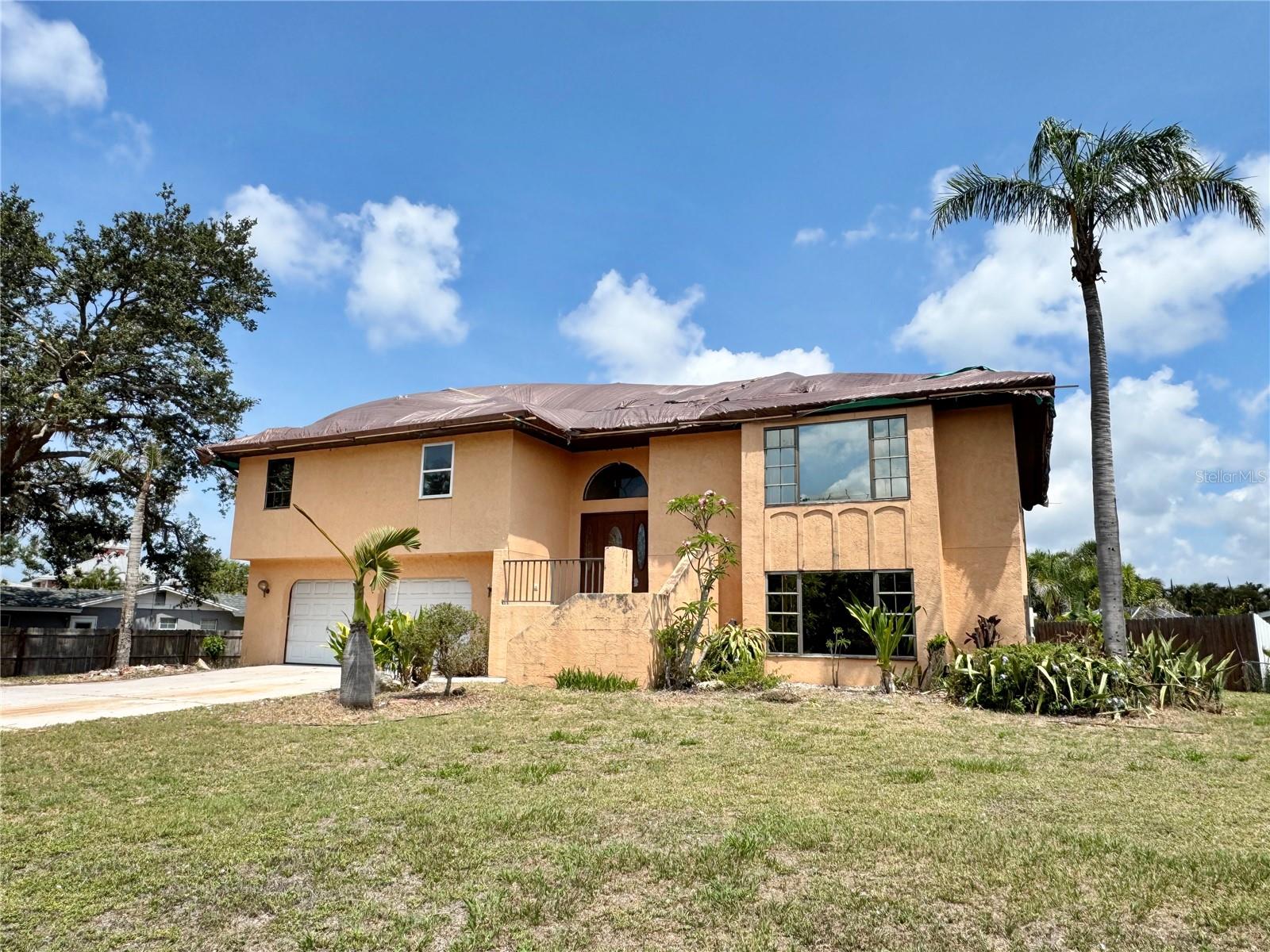 Auction Property. Welcome to 1611 Robbins Road in Nokomis—a unique multi-generational home nestled in the desirable Waterfront Estates community. This expansive 4,314 sqft residence, built in 1988, offers a total of 6 bedrooms and 4 full bathrooms (upper level is a 4/2 and lower level is a 2/2 with a Bonus/Office room), providing ample space for extended families or those seeking versatile living arrangements. The property is situated on a 0.43-acre lot with direct brackish canal access that leads to the Gulf of America. Designed as a "house on top of a house," the lower level encompasses a complete 3-bedroom, 2-bath suite with a spacious living room, a full eat-in kitchen, and direct outdoor access. The upper level mirrors this layout, offering additional living space and privacy. The home also boasts a private in-ground pool and spa, perfect for relaxation and entertaining. Nature lovers and boaters will especially appreciate the home’s proximity to Dona Bay. Nearby, Bird Island provides a natural sanctuary teeming with native seabirds and stunning sunsets, while Turner Key offers a hidden gem for adventurous kayakers and boaters exploring the coastal estuaries. Best of all, Nokomis Beach is just a short 8-minute drive away, offering a serene atmosphere with soft white sand and clear blue waters. The beach is popular among locals and tourists alike for swimming, sunbathing, and enjoying picturesque sunsets. This could be an exceptional investment opportunity in a desirable waterfront community with no HOA or deed restrictions; an ideal opportunity for long-term tenants, vacation rentals, a live/rent scenario or year round living for yourself! The waterfront lifestyle and proximity to Venice and Sarasota make this property an attractive draw. Don't delay in checking this one out, bring your buddies and transform this diamond in the rough back into the beauty that it once was!