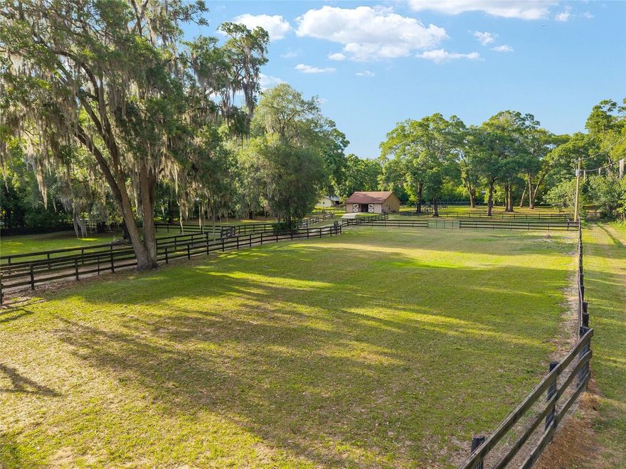 Beautiful 3+ acre equestrian-ready property just minutes from (WEC) the World Equestrian Center Ocala. Fully fenced and shaded by mature oaks, this property offers a peaceful, private setting with functional improvements already in place.

The center-aisle barn features multiple stalls, concrete aisle, excellent airflow, and a clean, well-maintained setup ready for immediate use. A separate living space with kitchenette and full bathroom provides flexibility for guests, staff, or weekend stays.
The land is usable and well laid out with paddock space, ideal for horses, training, or expansion. Located at the edge of protected farmland and growing development, you get the best of both quiet rural feel with quick access to shopping, dining, and major roads.

A1 zoning with no HOA allows for maximum flexibility—build your dream home, add a manufactured home, or simply enjoy as a turnkey horse property. Also perfect for buyers looking for space to store RVs, trailers, or equipment.
Rare opportunity to own a functional mini-farm in a prime Ocala location with strong future upside.

Rare opportunity to secure usable acreage in a highly desirable and rapidly developing area of Ocala.