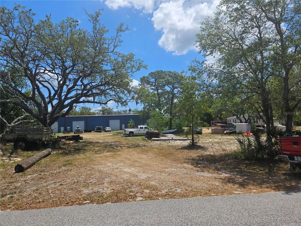 Photo of 12414 Choctaw Trail, Hudson, FL 34669 (MLS # O6310784)