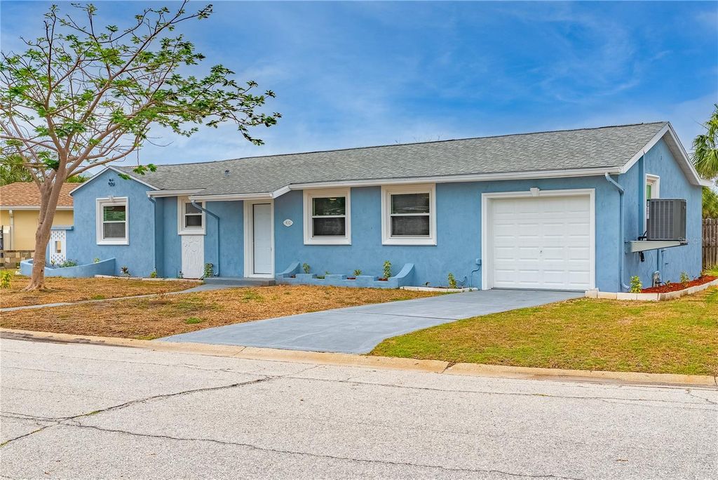 Photo of 410 Virginia Avenue, Madeira Beach, FL 33708 (MLS # TB8393858)