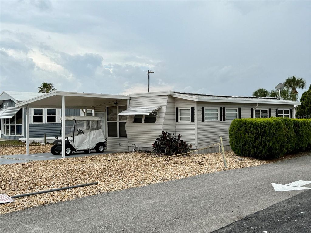 Photo of 317 Golf Crest Lane #58, Davenport, FL 33837 (MLS # TB8509111)