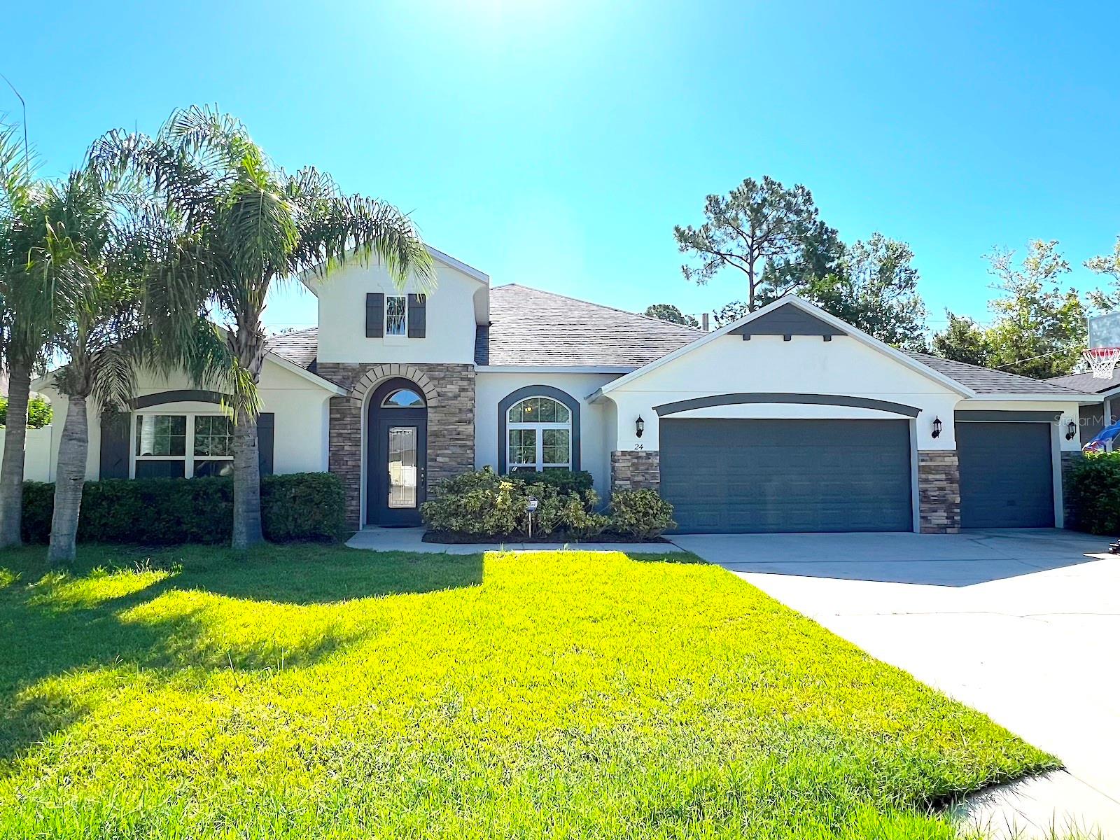 Huge Furnished 4 Bed 3 Bath 3 Car Home with Fully Fenced Yard for Rent in Palm Coast! Look no further than this tastefully furnished luxury home in the Cypress Knoll subdivision. This home features a spacious open floor plan, with tile throughout the main areas. The kitchen and all vanities feature granite counters, ample cabinetry and closet space, updated lighting and more. The home features tasteful decorating and partial furnishings as-is, enough to make it a turn key move in and living. Exit the living area to a spacious fully screened lanai overlooking the sizable FULLY FENCED yard. The home offers a 3 car garage and an oversized driveway, a unique feature for Palm Coast. Central location situates this rental close to Publix shopping plaza, with restaurants, banking, access to the Town Center, parks, and more! Easy access to the main roadways makes for a speedy drive to the beautiful local beaches, and a quick commute to Daytona or Jacksonville via I95. APPLY TODAY! LBTR#13922.