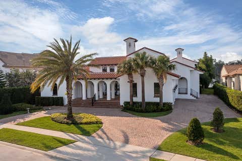 Photo of 5619 Emerson Pointe Way, Orlando, FL 32819 (MLS # O6409856)