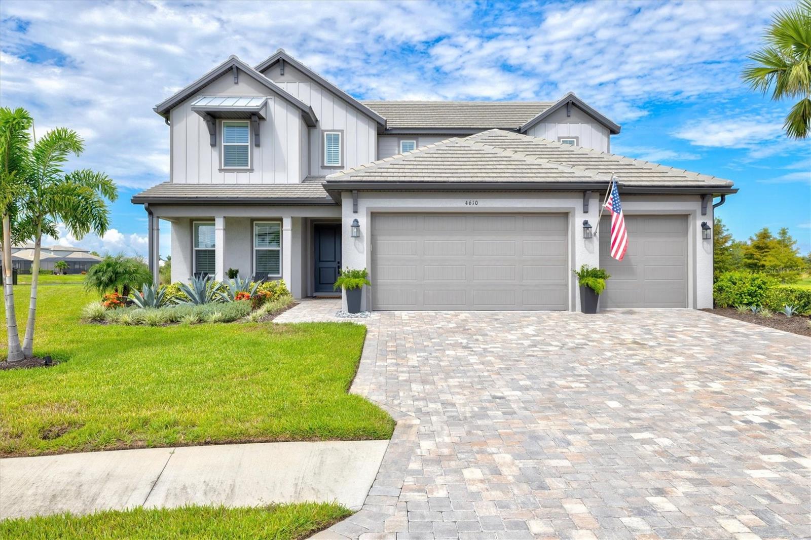 Welcome to this beautifully appointed Juniper model located on a rare cul-de-sac within the highly sought-after Sweetwater community in Lakewood Ranch. Thoughtfully designed and meticulously upgraded, this 4-bedroom, 3.5-bathroom home offers a perfect blend of luxury, comfort, and functionality with impact windows and doors throughout.
Step inside to find continuous tile flooring throughout the main level, creating a seamless and stylish flow. The primary suite is a true retreat, complete with an oversized spa-like bathroom and a custom walk-in closet that’s as functional as it is beautiful.
The open-concept layout is perfect for both everyday living and entertaining, with a spacious living and dining area that effortlessly connects to the heart of the home. The chef’s kitchen flows into the expansive screened lanai, where you’ll find a custom outdoor kitchen — ideal for enjoying Florida’s indoor-outdoor lifestyle.
Upstairs, a versatile loft area provides an additional gathering space, along with three generously sized bedrooms and two full bathrooms—perfect for guests or family.
Why wait to build? This home is truly move-in ready, with over $82,000 in post-closing upgrades, including:
Custom closets and walk-in pantry
Designer lighting fixtures throughout
Elegant window treatments
Full interior repaint
Gutters
High-end Toto toilets throughout
Professionally installed Monkey Bar garage storage system
Complete landscape refresh for added curb appeal
Advanced security system with front camera
Stunning custom outdoor kitchen
Enjoy peaceful mornings and serene preserve views from your private lanai — with no rear neighbors and breathtaking sunrises. The professionally designed landscaping adds both beauty and privacy.
As a resident of Sweetwater, you’ll enjoy resort-style amenities including a clubhouse, fitness center, heated pool, pickleball courts, and playground — all within one of Lakewood Ranch’s premier communities.
If you’re ready to entertain by the pool, relax in nature, and enjoy modern comfort in a prime location, this home is the one you've been waiting for.