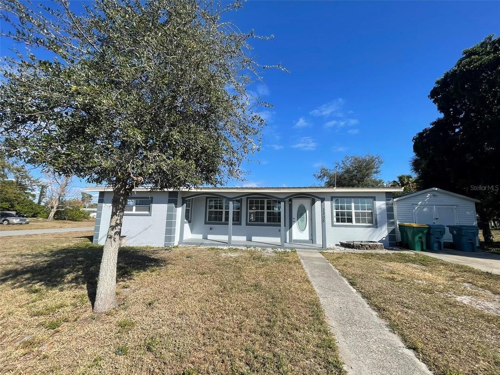 Photo of 3308 Elkcam Boulevard, Port Charlotte, FL 33952 (MLS # A4681227)