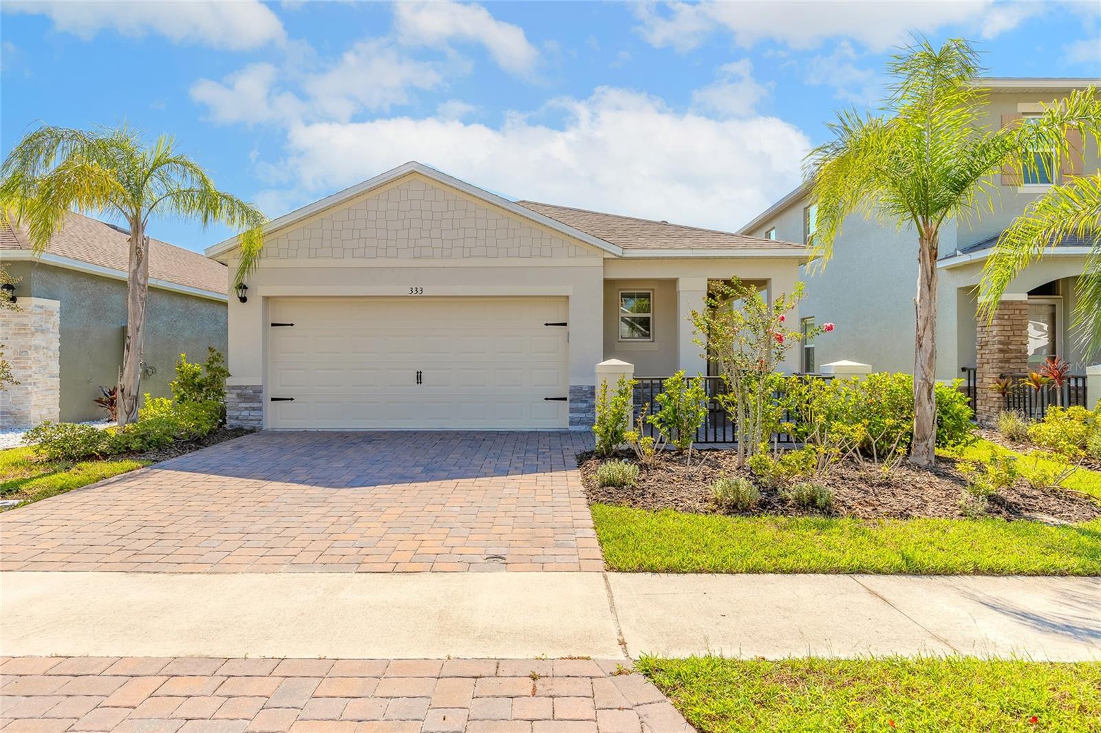 Step into luxury and comfort with this almost new stunning 3-bedroom, 2-bath home located in the highly sought-after Palms at Venetian Bay. Built in 2022, this move-in-ready residence features the popular Jovany floor plan, offering a thoughtfully designed open layout perfect for modern living and entertaining. Enjoy high-end finishes throughout, including tile flooring, granite countertops, and stainless steel appliances. The spacious kitchen flows seamlessly into the main living area, creating a warm, inviting atmosphere ideal for family gatherings or relaxed evenings at home. Outside, a private courtyard, paver driveway, and low-maintenance landscaping offer both curb appeal and functionality. This home also comes equipped with smart home technology, allowing you to control lighting, security, and climate with ease. Nestled in the golf-cart friendly community of Venetian Bay, residents enjoy access to walking trails, parks, pickle ball courts, spa, dining, and an 18-hole championship golf course—all just minutes from the beach. Whether you're downsizing, relocating, or looking for the perfect Florida retreat, 333 Caryota Ct offers the best of coastal living with modern style and community convenience. Call today for your private showing. All information is thought to be accurate, but not guaranteed.