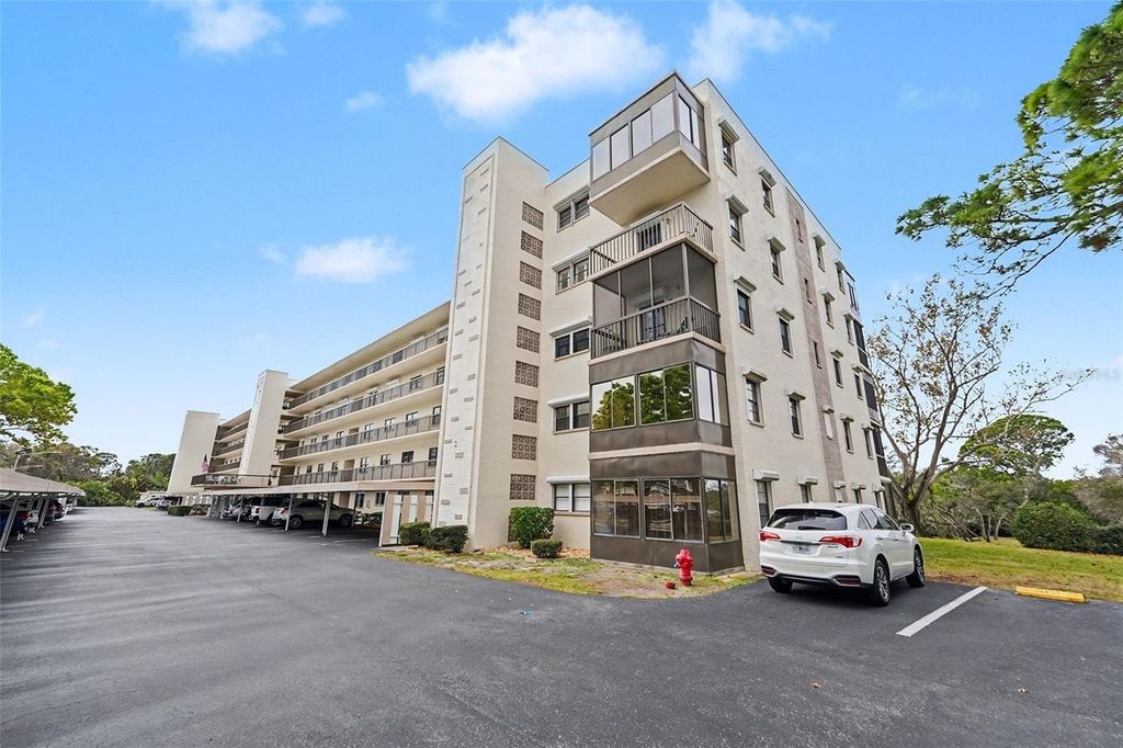 Photo of 8198 Terrace Garden Drive N #411, St Petersburg, FL 33709 (MLS # TB8469309)