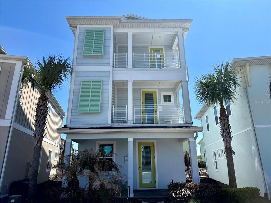 STUNNING FULLY FURNISHED 4 BEDROOM, 4.5 BATH COTTAGE WITH PRIVATE HEATED POOL & SPA AT MARGARITAVILLE RESORT ORLANDO! This exceptional home offers FRONT BALCONIES ON BOTH THE SECOND AND THIRD FLOORS. Step inside to a bright, open-concept living space designed for comfort and entertaining. The spacious living room flows seamlessly into the kitchen, showcasing QUARTZ COUNTERTOPS, STAINLESS STEEL APPLIANCES, ample cabinetry, and generous prep space. "WOOD" TILE FLOORING and CEILING FANS throughout. The first floor includes a HALF BATH and HIGH-CAPACITY WASHER AND DRYER. Upstairs, each bedroom is thoughtfully designed with its own bathroom. Enjoy true indoor-outdoor living with direct access to the PAVED PATIO, where your PRIVATE HEATED POOL AND SPA. MRO Approved furniture and housewares package INCLUDED in the list price. That means high-end furnishings, blinds, drapes, TVs, artwork, kitchen essentials, dishware, linens, and more. Enjoy access to a one-of-a-kind resort lifestyle with multiple pools, restaurants, bars, live music, fitness center, on-site water park, retail shops, and more. And the location? Just minutes from Walt Disney World and Central Florida’s world-famous attractions.