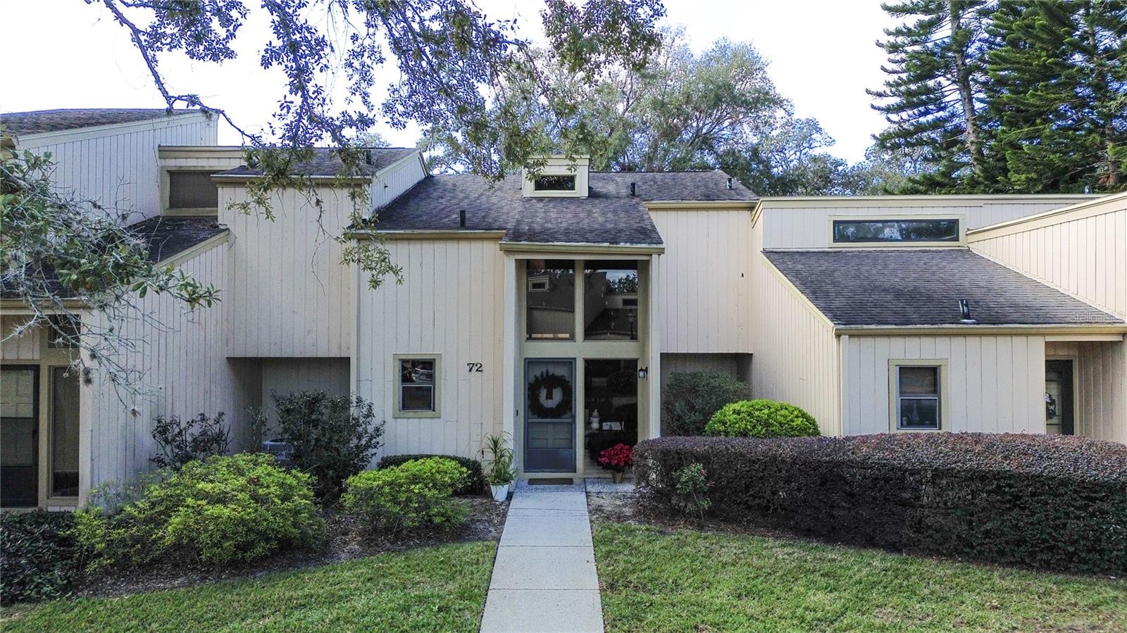 Beautiful and spacious 2-bedroom, 2-bathroom condo for rent in the desirable Aspenwood at Grenelefe community, just minutes from Disney and Central Florida’s top attractions. This light-filled home features an open floor plan with soaring wood cathedral ceilings, skylights, and large windows. The first-floor bedroom offers double closets, private lanai access, and an en suite bathroom with soaking tub. Upstairs includes a second bedroom, fully renovated bathroom with modern walk-in shower, loft space, and a private bonus room ideal for office or guests. Enjoy the screened lanai, heated community pool, recreational courts, and peaceful golf community lifestyle. Includes multiple storage areas and a golf cart garage. Conveniently located near shopping, dining, entertainment, and major highways. Ready for immediate move-in!