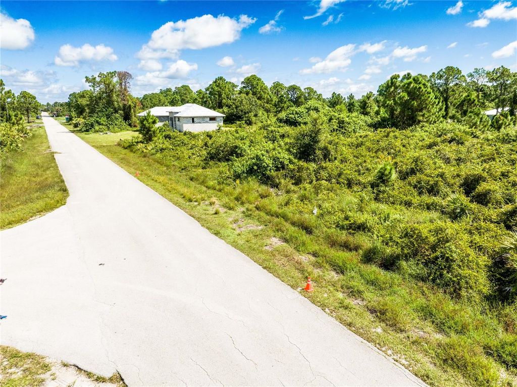 Photo of 433 Long Avenue S, Lehigh Acres, FL 33974 (MLS # A4625995)