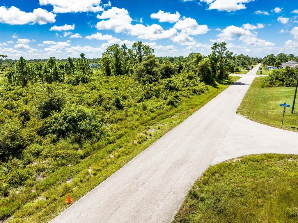 Photo of 433 Long Avenue S, Lehigh Acres, FL 33974 (MLS # A4625995)