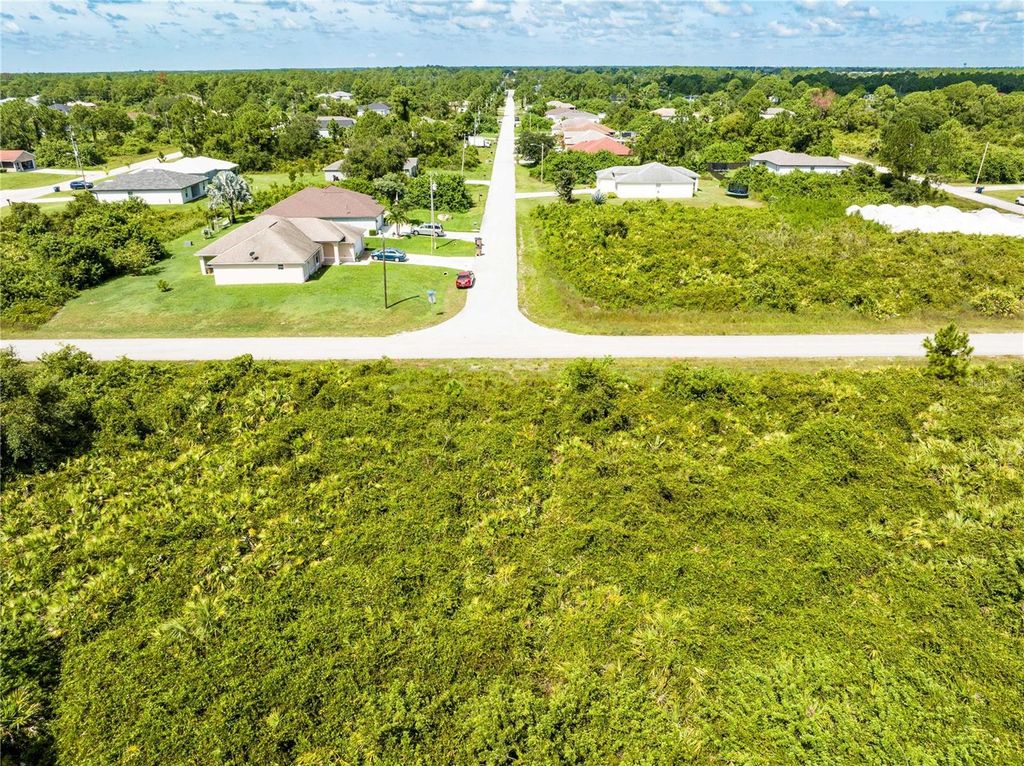 Photo of 433 Long Avenue S, Lehigh Acres, FL 33974 (MLS # A4625995)