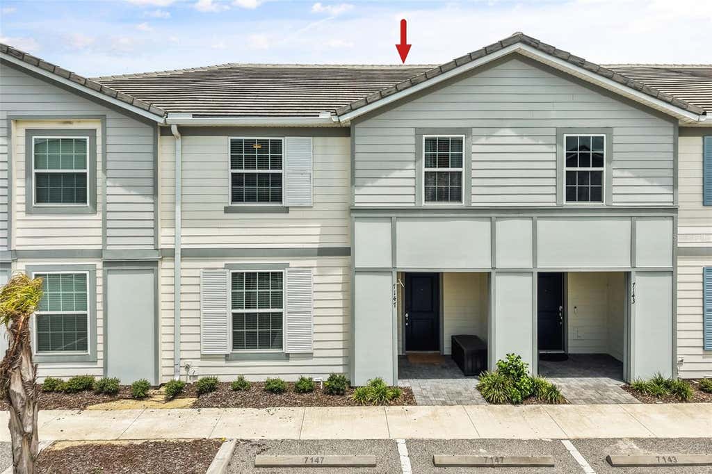 Photo of 7147 Oakmoss Loop, Davenport, FL 33837 (MLS # O6431711)