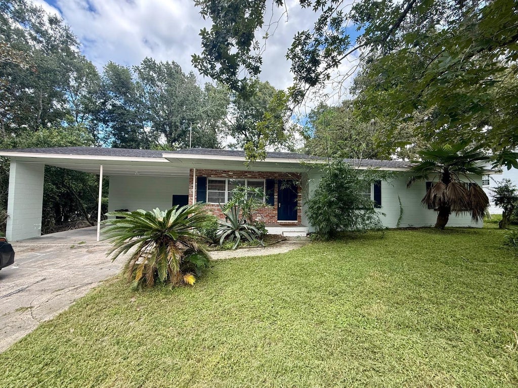 Photo of 3330 NW 31st Avenue, Gainesville, FL 32605 (MLS # O6441752)