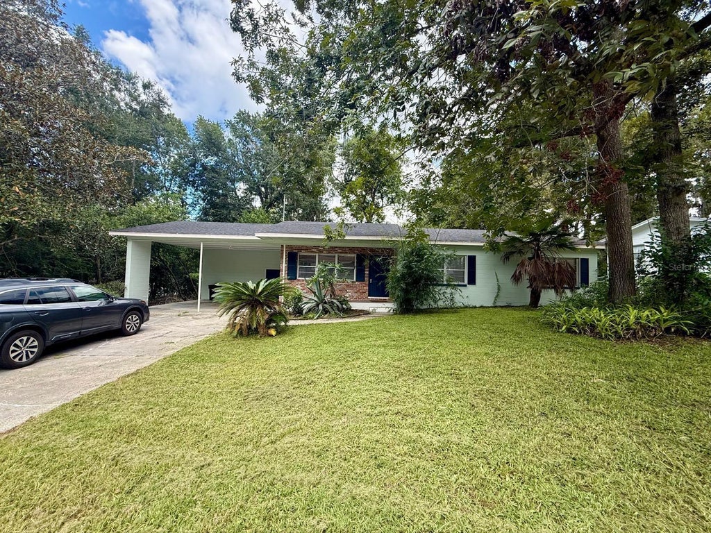 Photo of 3330 NW 31st Avenue, Gainesville, FL 32605 (MLS # O6441752)