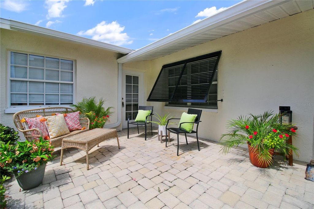 Photo of 8785 Wildwood Lane, Seminole, FL 33776 (MLS # TB8406551)