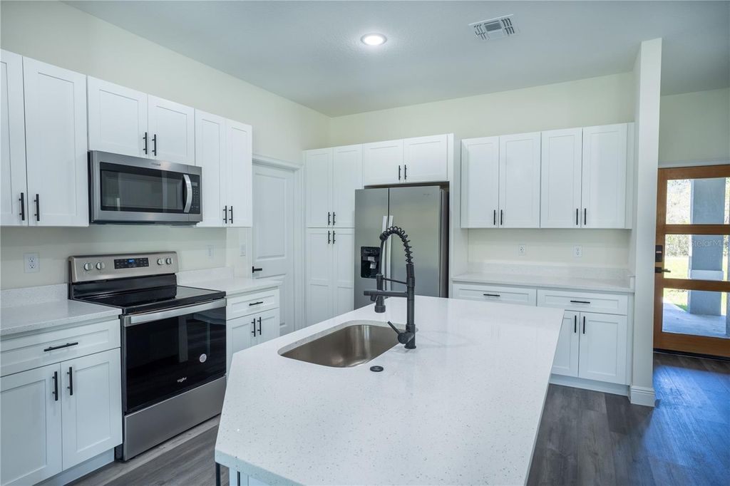 Photo of 5 Fisher Loop, Ocklawaha, FL 32179 (MLS # O6296118)