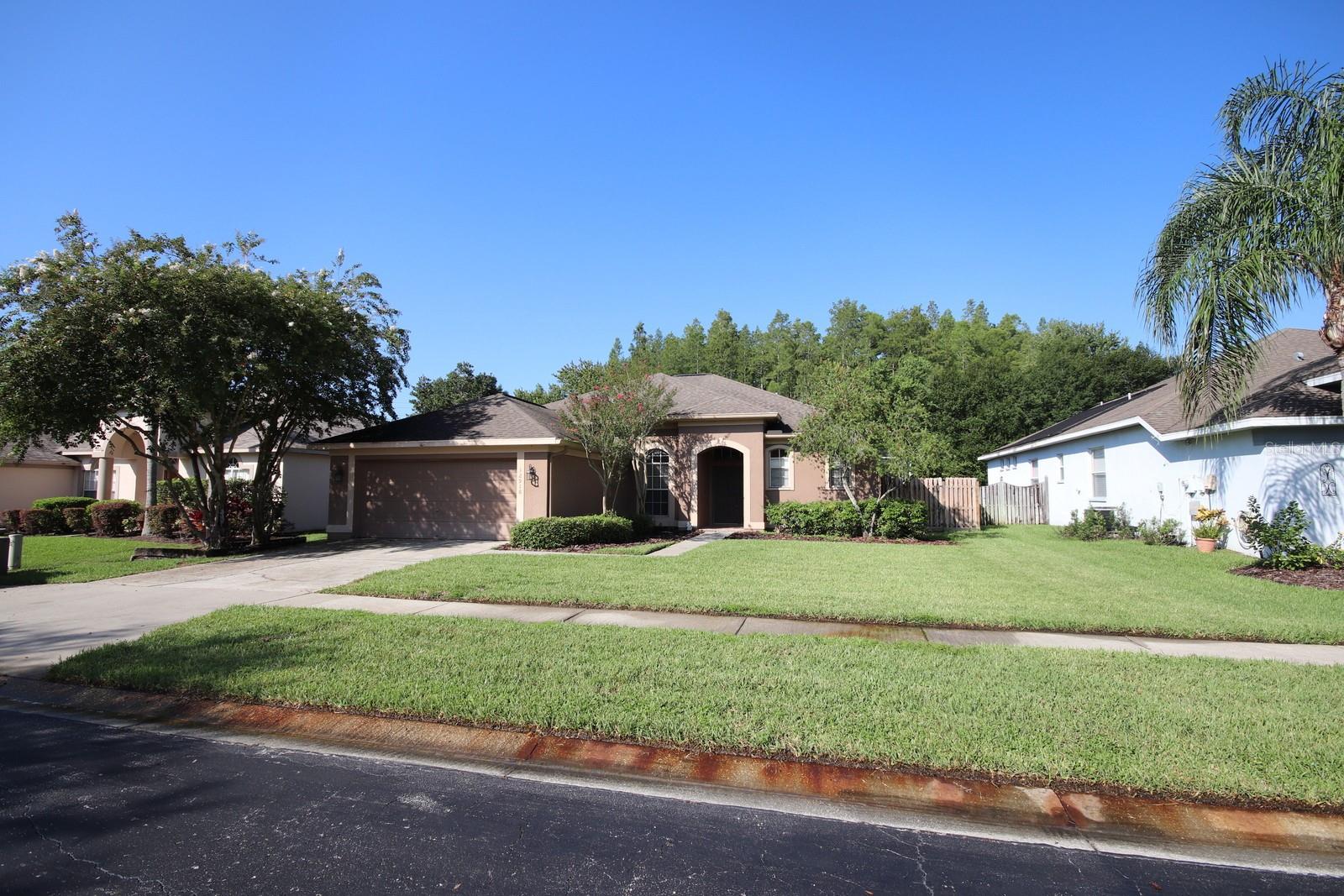 Spacious 4 bedroom, 2 bath POOL home with attached 2-car garage located in Carrollwood Reserve. Wonderfully close to Citrus Park and all of the areas fun activities, abundant shopping, dining and entertainment. This lovely home features a screened enclosed pool with brick walk-way. Very pretty! The master bedroom offers an en-suite master bath that has a large garden tub, glass enclosed shower and double vanities. The kitchen opens into the main living area from the breakfast bar and has nice wood cabinetry and tile flooring. LAWN CARE AND POOL CARE included in the rent!
