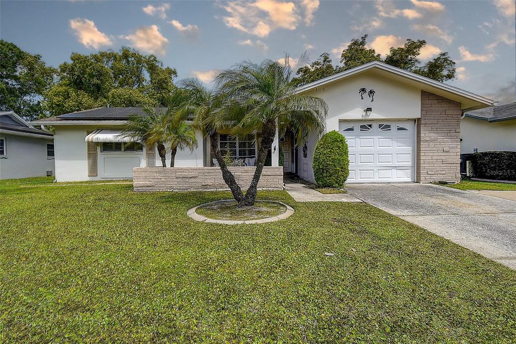 Photo of 2955 Briar Cliff Drive, Palm Harbor, FL 34684 (MLS # TB8445711)