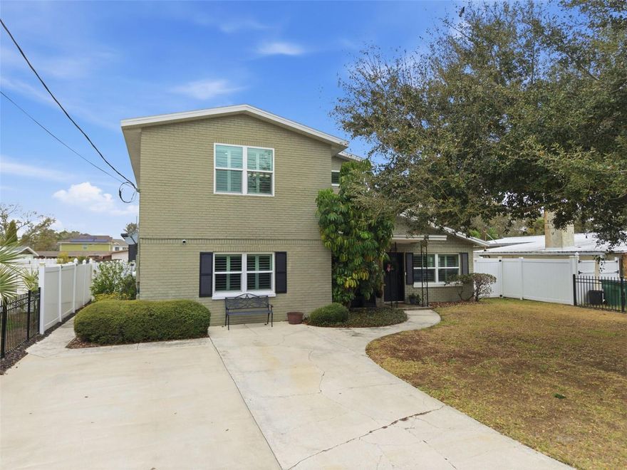 Life feels easier, more comfortable, and more connected in a home designed to support the way you truly want to live. With spacious living areas, thoughtful updates, and incredible indoor-outdoor flow, this 4-bedroom, 4-bath residence, with detached guest house, offers the best of the Tampa lifestyle. A welcoming, relaxed atmosphere has been created in this home with carefree wood look plank tile flooring and plantation shutters. Multiple living spaces both inside and out—including a comfortable living room, separate family room, exterior screened and coveredlanai and a guest house—give everyone an opportunity to find their personal space. The formal dining room sets the stage for gatherings and special celebrations. After dinner relax in the family room watching your favorite show or listening to music.  At the heart of the home, the beautifully updated kitchen (2018) is designed for both connection and convenience. Wood cabinetry with crown molding, granite countertops, a breakfast bar  and Samsung appliances—including a European style refrigerator, microwave, and flat-top range—create the space everyone wants to gather. A spacious laundry room with storage space helps keep daily life organized and running smoothly. Step through the dining room’s sliding glass doors and experience what Florida living is all about. The screened lanai and sparkling Pebble Tech pool create your own private retreat—perfect for morning coffee, weekend memories, or evenings filled with conversation. With cable and speaker pre-wiring already in place, this outdoor space is ready for game days and year-round fun! This is truly Florida lifestyle living at its best. The private second story primary suite addition was thoughtfully designed with two walk-in closets with custom California Closets organization and a spa-like bath with dual vanities, a free standing soaking tub, step-in shower, and private water closet. Three additional bedrooms and two baths on the first floor—including a private ensuite bathroom—provide flexibility for family, guests, or work-from-home needs. Adding even more lifestyle versatility, the detached guest house (2018) with  kitchenette, full bath, and walk-in closet, is ideal for visiting family, multigenerational living, a private home office, fitness studio, or creative studio. Peace of mind comes with major updates already completed, including a 2022 roof with 30-year dimensional shingles, updated plumbing (2018–2022), electrical update (2022), double-pane windows (2018), and a 120-gallon water heater (2022). Additional features such as an irrigation system, ADT security system, and attic storage add everyday convenience. Enjoy a location just minutes from Target, Publix, and Starbucks for daily errands and morning routines. An outstanding location with quick access to the Crosstown Expressway and convenient proximity to both Downtown Tampa and Downtown St. Petersburg. Literally minutes to MacDill Air Force Base. For outdoor enjoyment, the iconic Bayshore Boulevard is just a short stroll away-perfect for walking, running, biking, or catching stunning waterfront sunsets. With exceptional indoor-outdoor living, flexible spaces, major updates, and a location that puts everything within reach, this is a home where everyday life feels effortless and the lifestyle truly shines. Welcome Home!