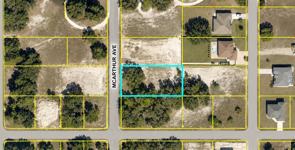 Photo of 1702 Mcarthur Avenue, Lehigh Acres, FL 33972 (MLS # K4903860)